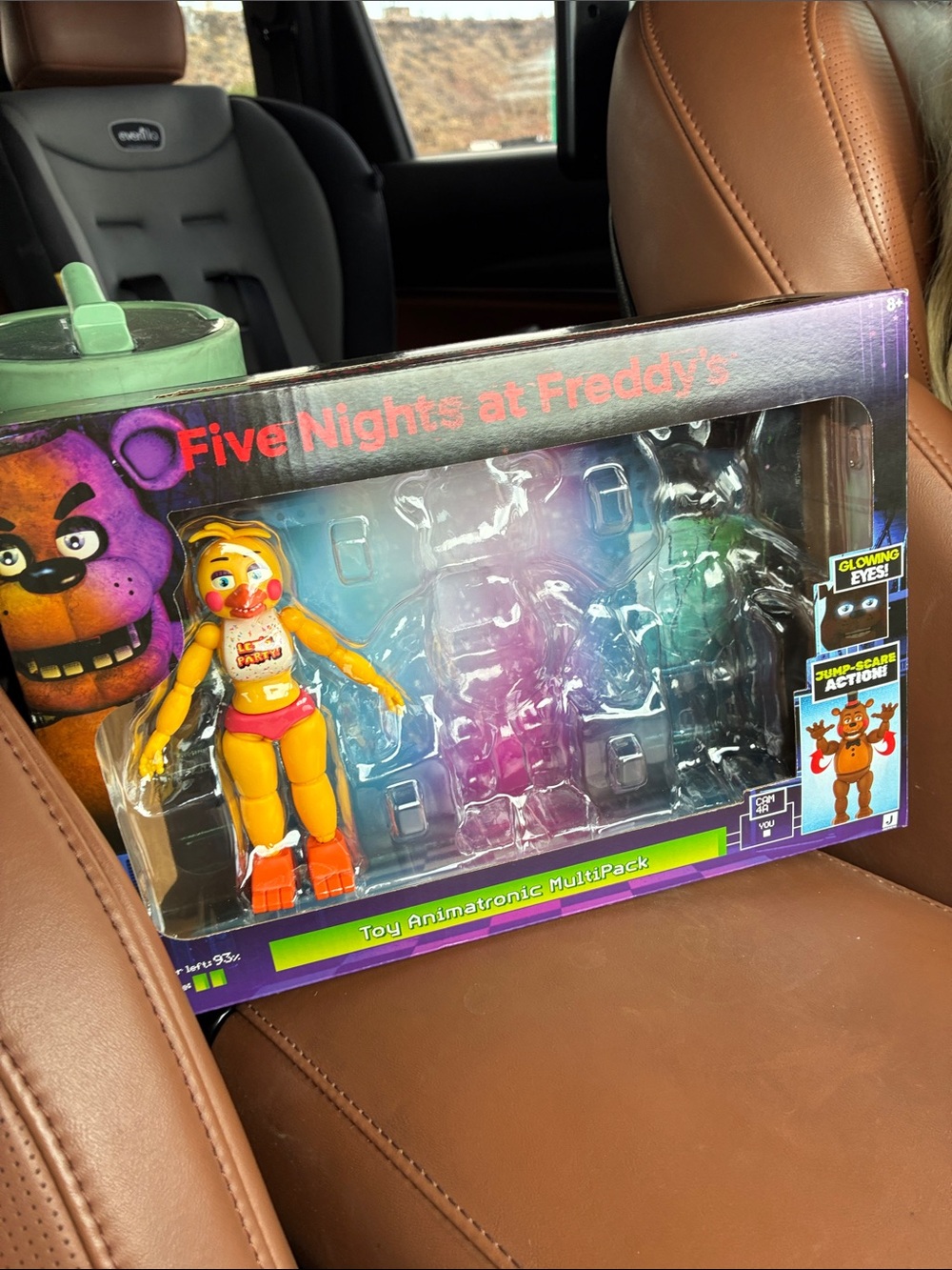 Jazz wears toy chica action figure